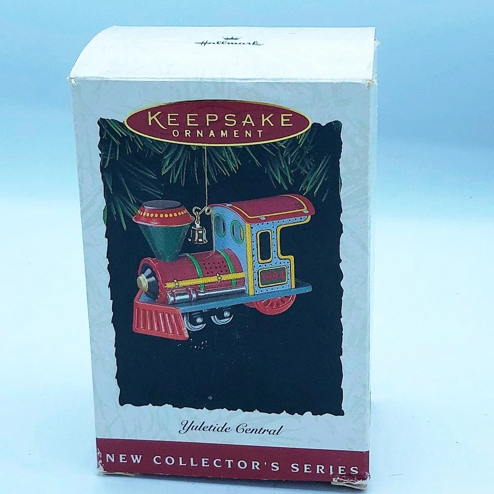 Yuletide Central #1 in ser Hallmark Ornament Tin Train 1994
